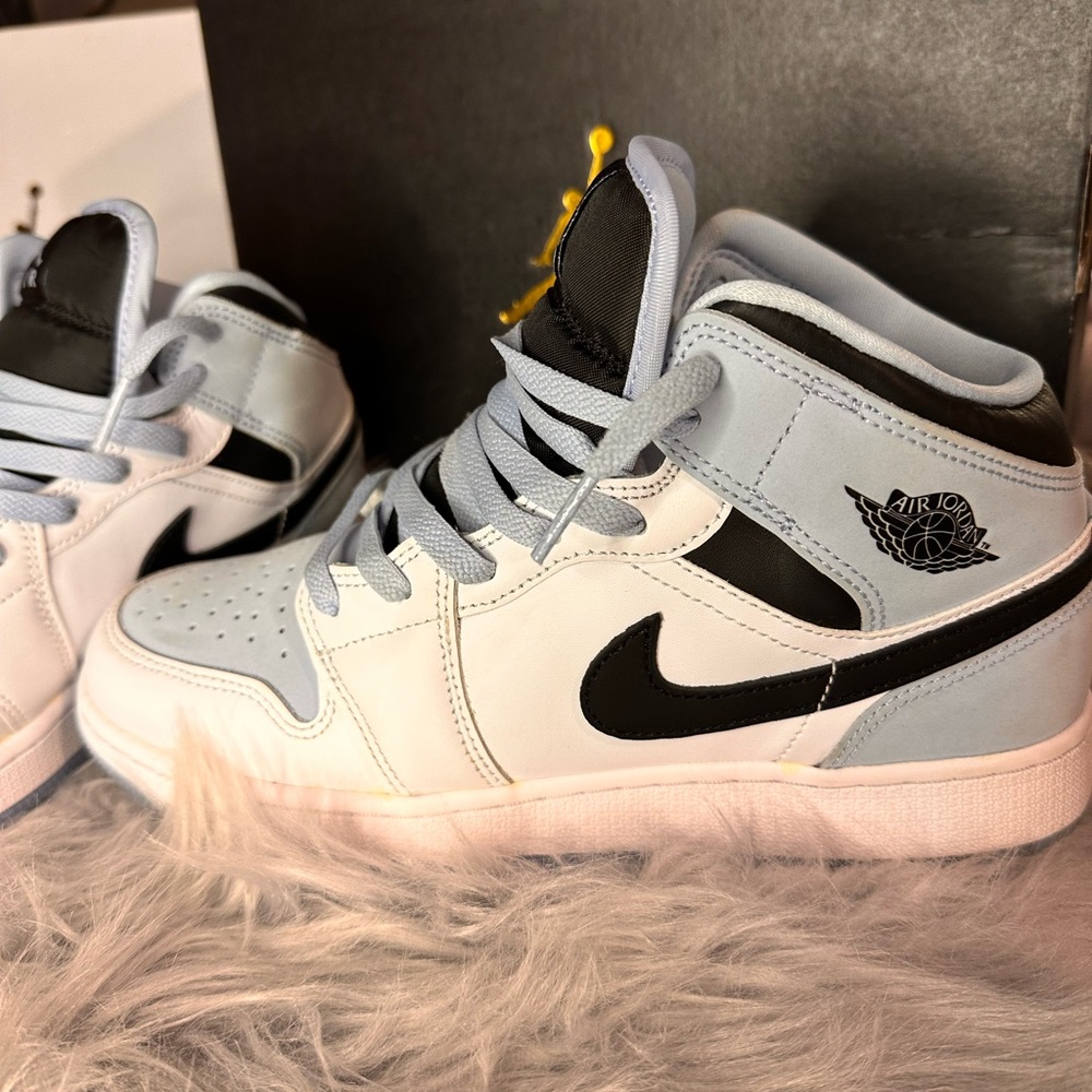 Air Jordan high top sneakers women’s baby  blue and black.